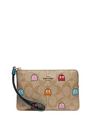 Coach Corner Zip Wristlet in Signature Print with Pac Man